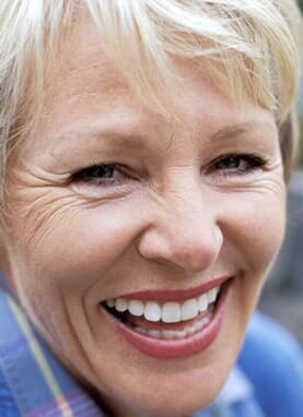 Portrait of a senior woman smiling — About Advanced Denture in Vancouver, WA