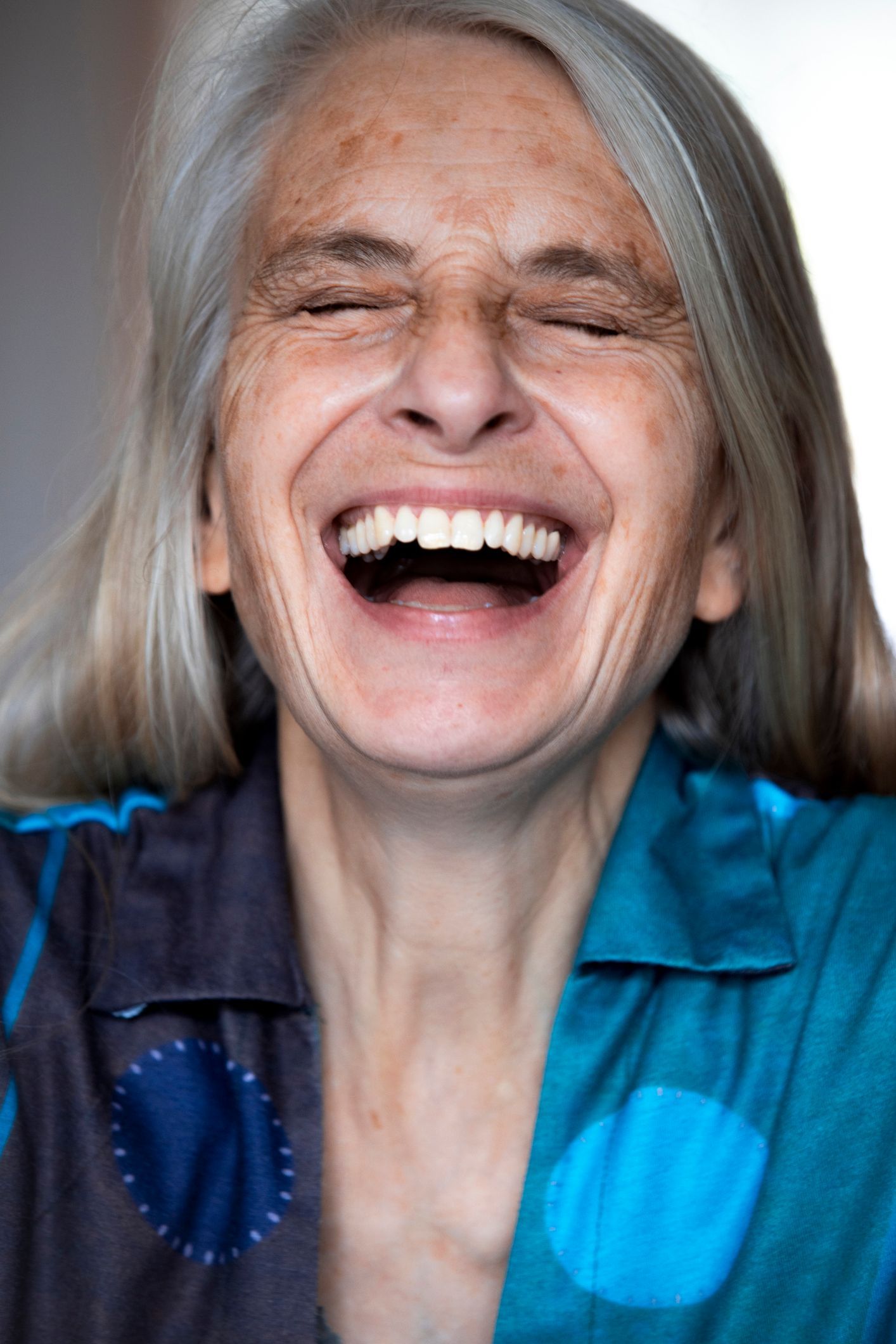 A Portrait of a Senior Woman, Laughing — About Advanced Denture in Vancouver, WA