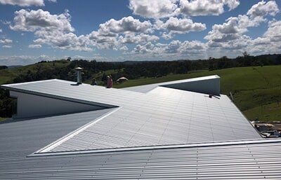Grey roof — Roofing and plumbing services in Brisbane, QLD