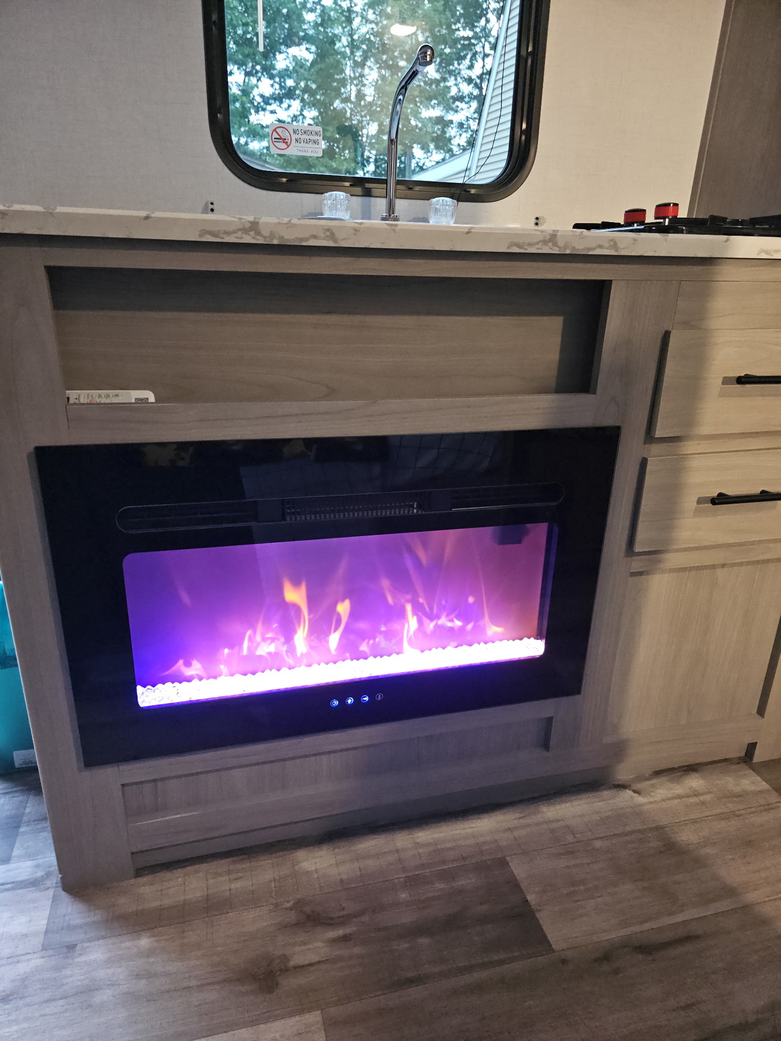 Coleman 17B fireplace and entertainment area