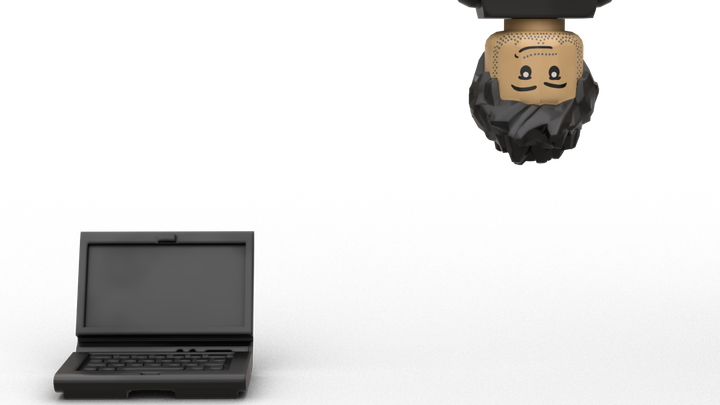 image of a lego laptop and the upside bust of a lego version of Cali, the owner of A Rising Tide