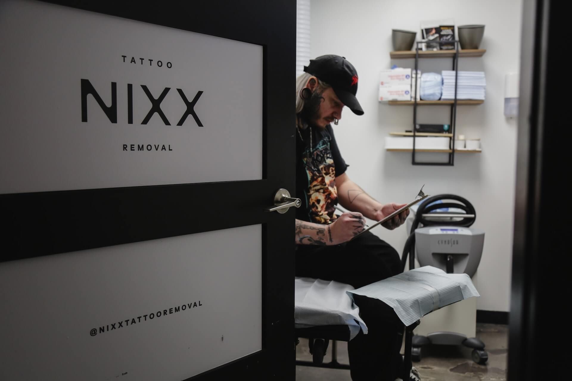 Black Picosure and Hollywood Spectra laser machine with attached arms and digital touchscreens.