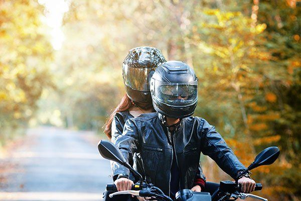 A Couple Riding on a Motorcycle — Hopewell, VA — A-1 Insurance Agency