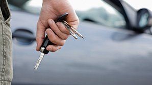 A Man Holding Car Keys — Hopewell, VA — A-1 Insurance Agency