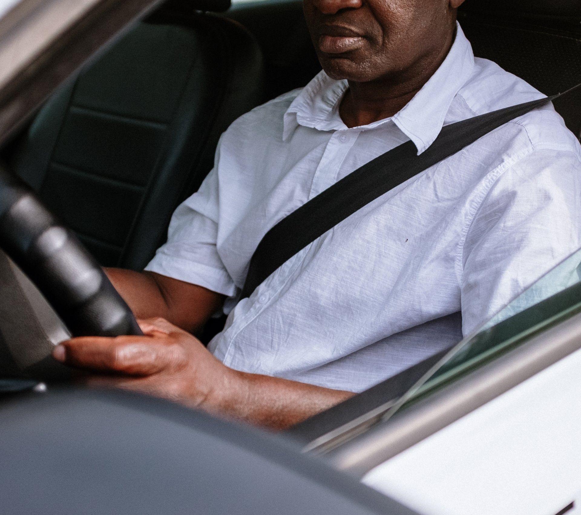 Man reversing car transmission