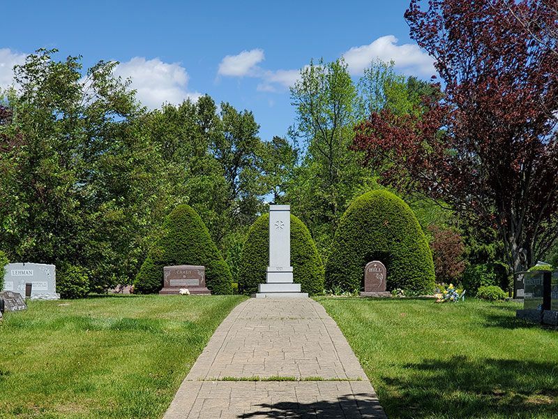 Brick path leading to headstones