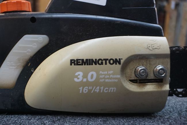 A remington 3.0 chainsaw is sitting on a table