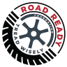 Circular logo with a black tire tread border, a dark gray star-shaped wheel, and red 