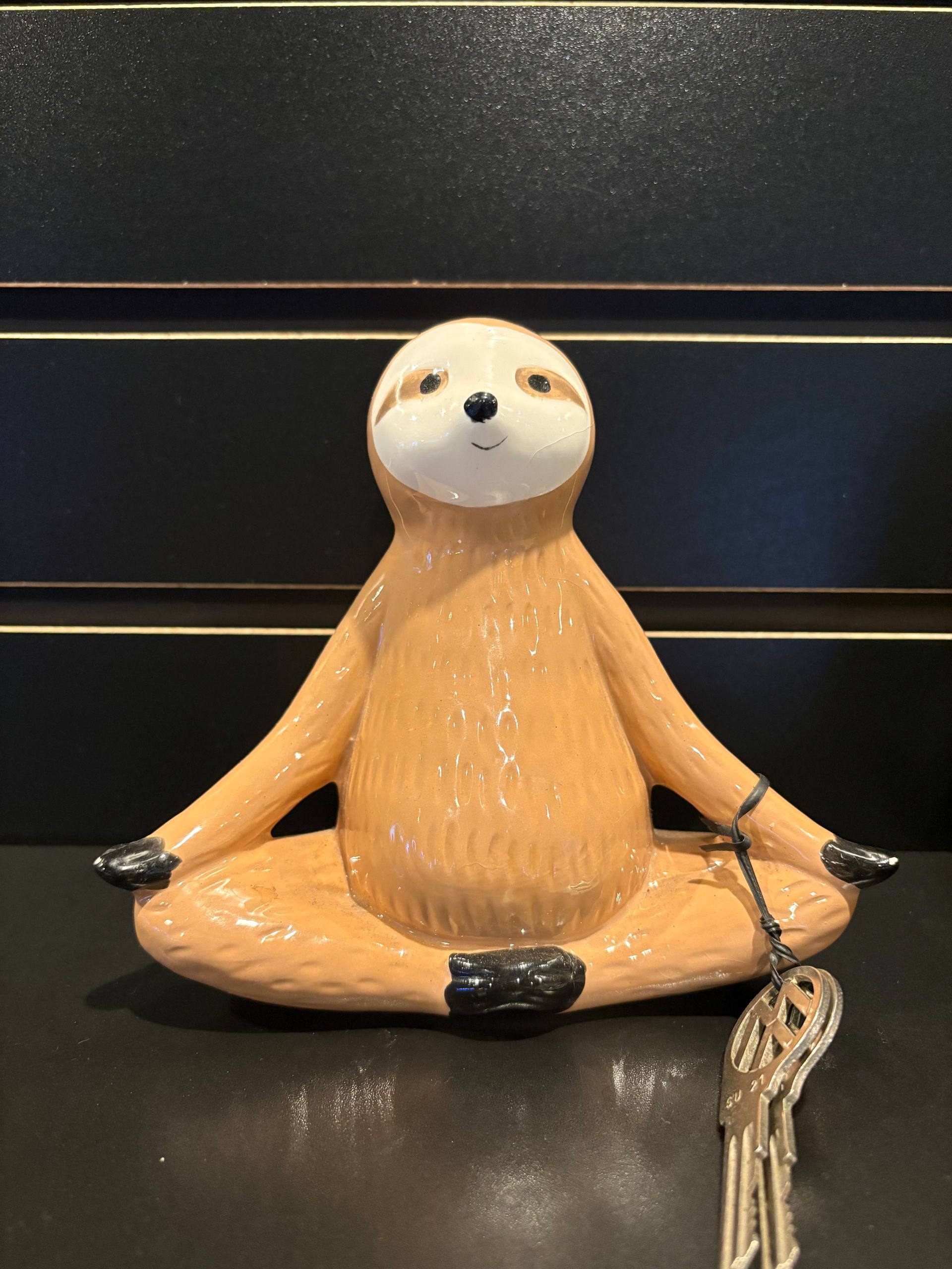 Red sandstone slot canyon, curved walls, sunlight from above.