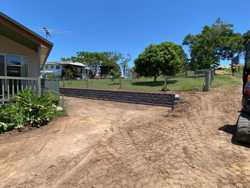 A Truck is Parked on the Side of a Dirt Road — Jaya Rose Earthworks and Landscape Contractors In Gulmarrad, NSW