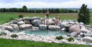 Irrigation Installation — Kids Ready to Swim in a Pond in Longmont, CO