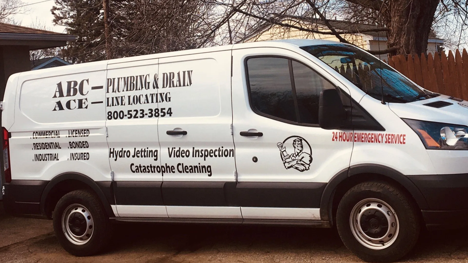 White plumbing van with logo 