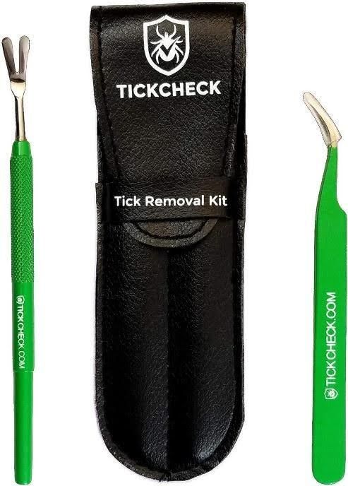 a green tick removal kit with a black case