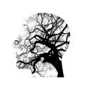 A black and white silhouette of a tree in the shape of a human head.