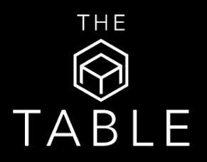 The table logo is white on a black background.