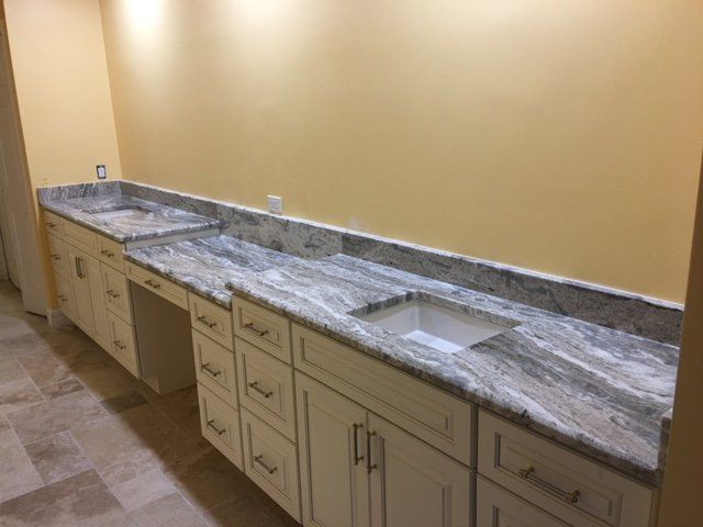 bathroom remodel in progress granite countertop his and hers sink with cabinets