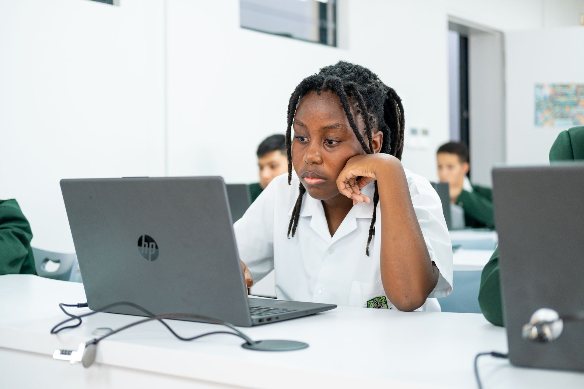 An artist 's impression of a large building with a car parked in front of it.