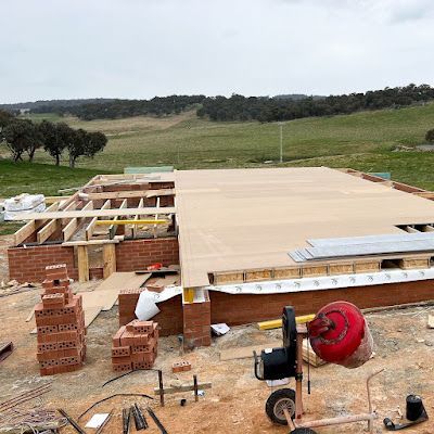 A House Is Being Built in The Middle of A Field — Thomas Croker Constructions In Myrtleville, NSW