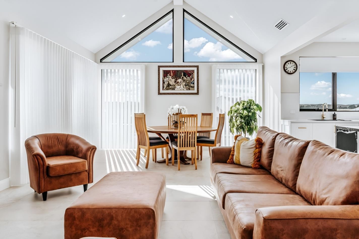 Living Room With Brown Leather Furniture — Thomas Croker Constructions In Canberra, NSW