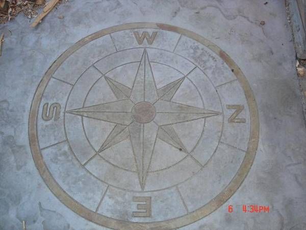 acid stained concrete compass