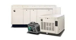 Generators of varying sizes: home standby and portable. White enclosures; Cummins logo.