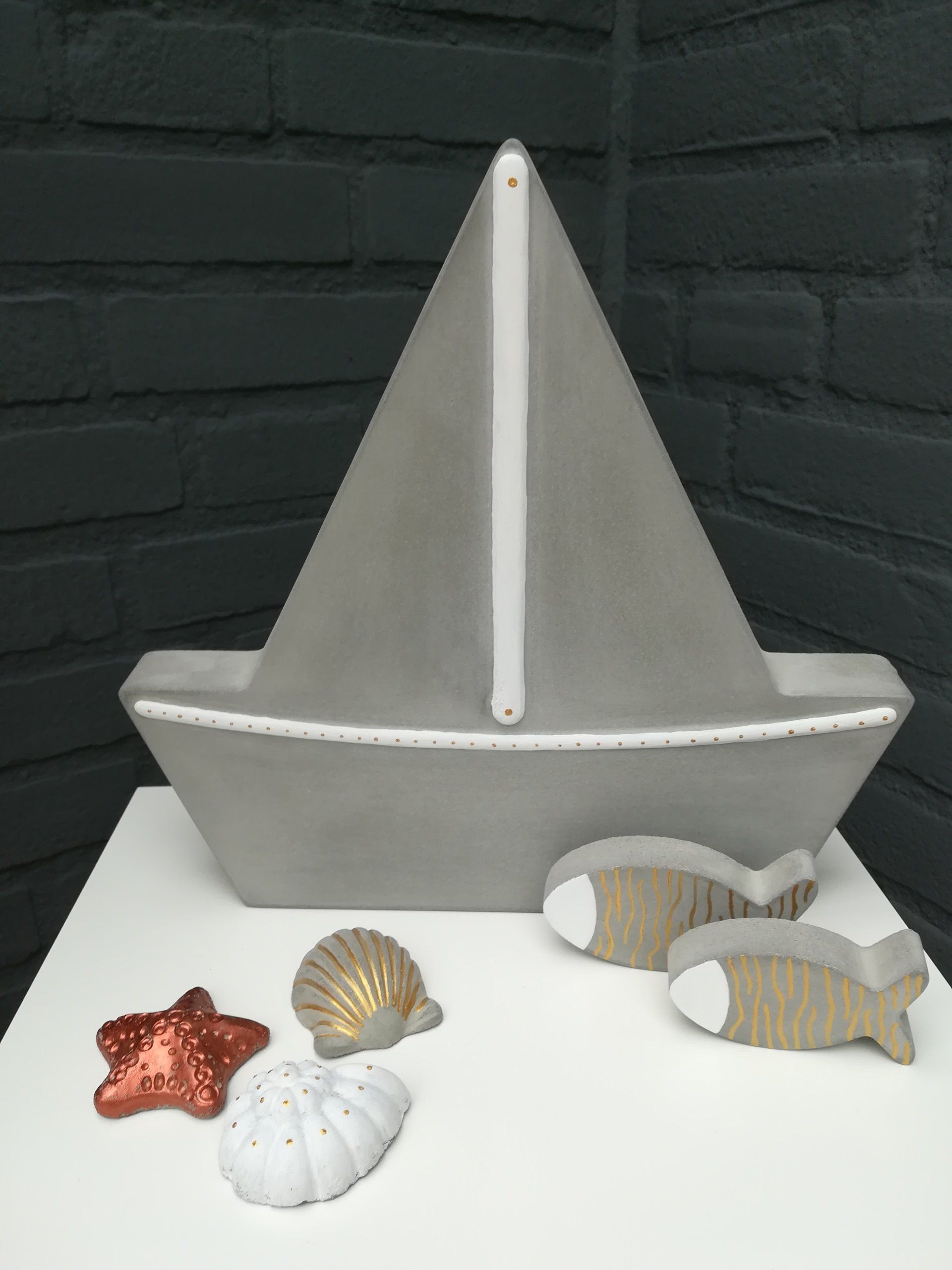 unieke maritiem deco, maritiem deco van cement, maritiem deco van baton, betonnen deco maritiem, cement deco maritiem, handgemaakte maritiem deco, handgemaakte cementdeco, handgemaakte betondeco, vis van cement, vis van beton, unieke visdeco, unieke deco vis, boot van cement, boot van beton, unieke bootdeco, handgemaakte bootdeco