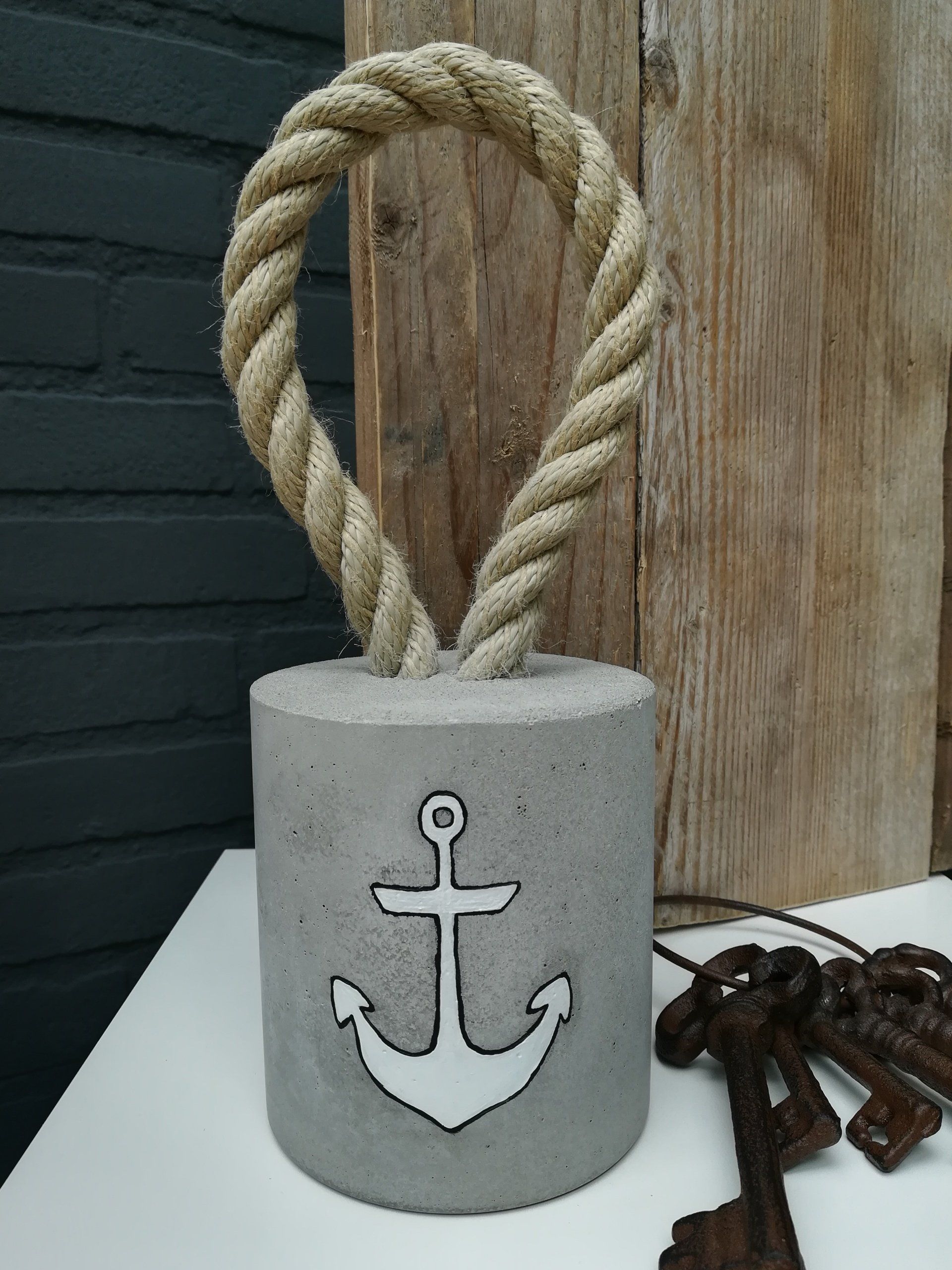 unieke deurstopper, unieke deurstopper van beton, unieke deurstopper van cement, deurstopper van beton, deurstopper van cement, maritiem deurstopper, anker op deurstopper, handgeschildert anker, uniek anker deurstopper