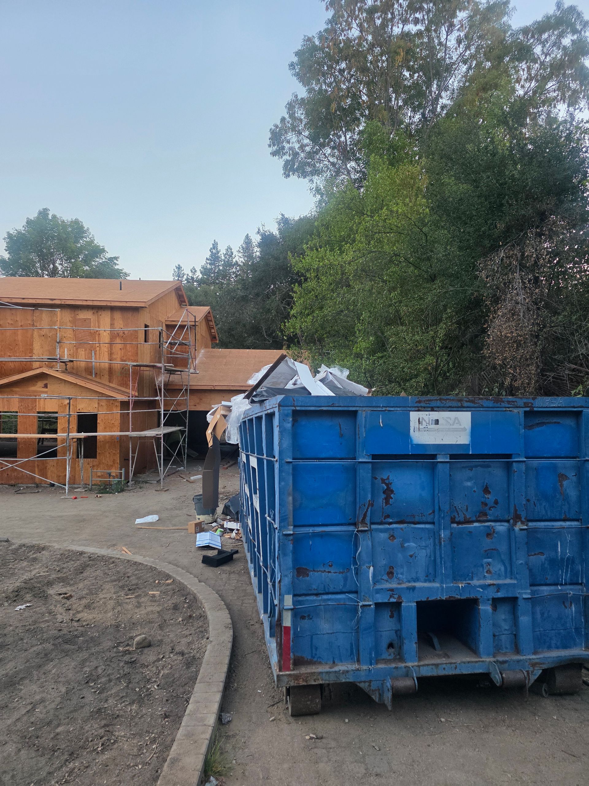 Dumpster on site at a construction project