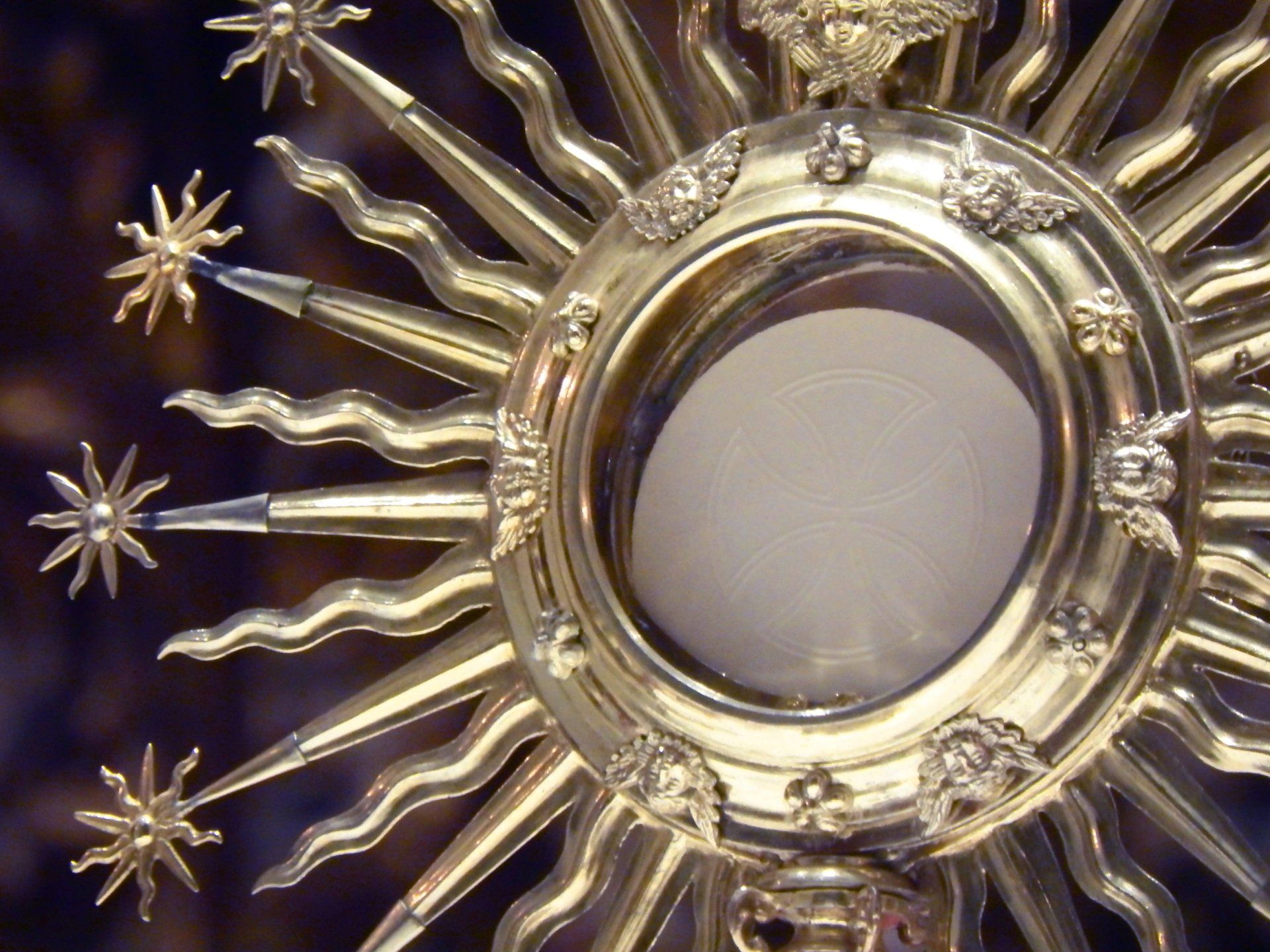 Jesus in the Eucharist exposed in a monstrance for Adoration.
