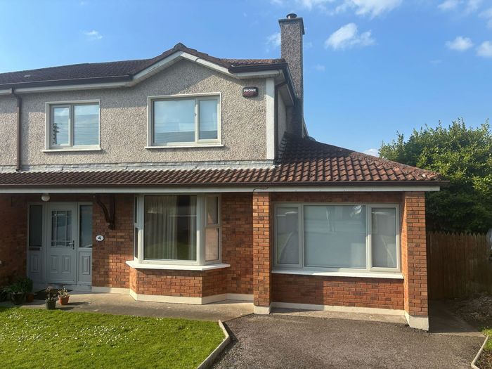 A large brick house with upvc windows in sligo.