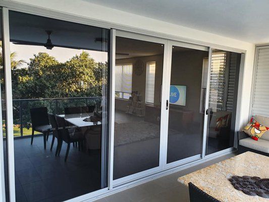 Crimsafe Security Door Installation  — Glazier in Garbutt, QLD