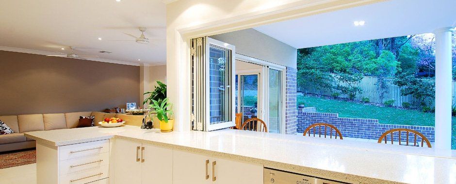 Kitchen Bi-Fold Windows Installed — Aluminium Windows in Garbutt, QLD