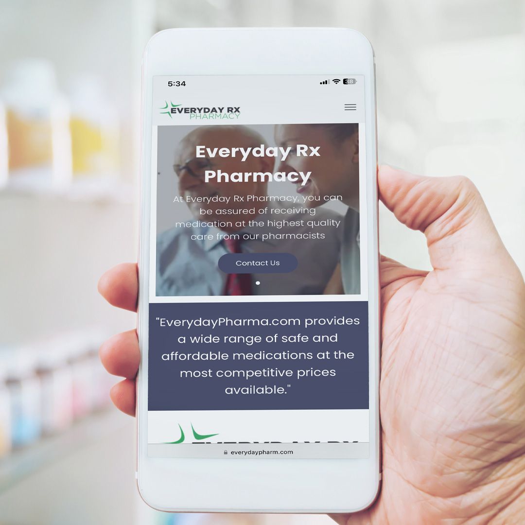 A person is holding a cell phone that says everyday rx pharmacy