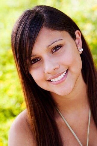 Teenage Girl Smiling— General Dentistry in Tallahassee, FL