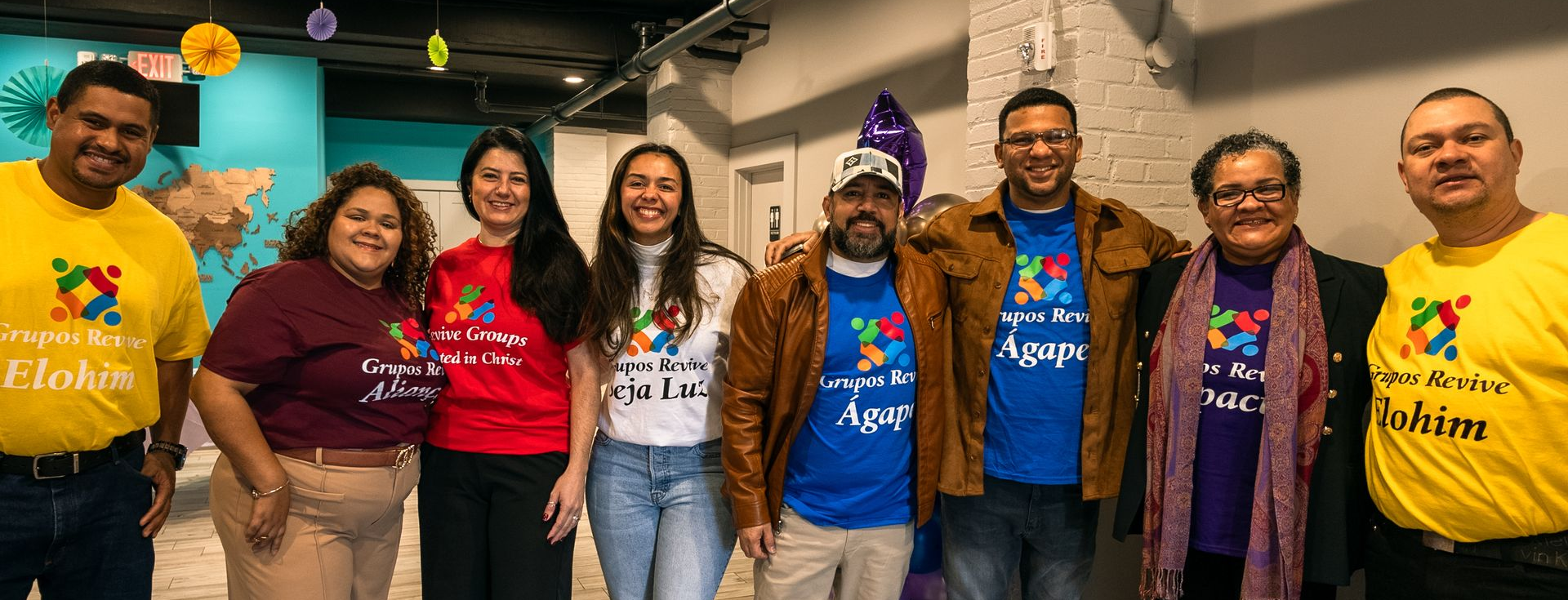 a group of people are posing for a picture 