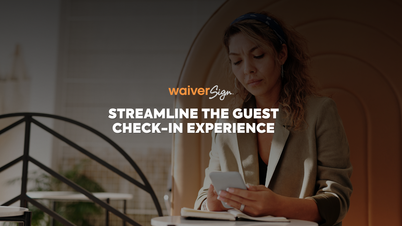 a person holding a phone and text on top of the image guest check-in experience 