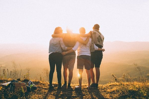 Friends on a Mountain Sunset