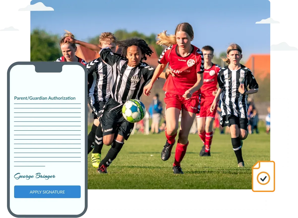 A group of young girls are playing soccer on a field.