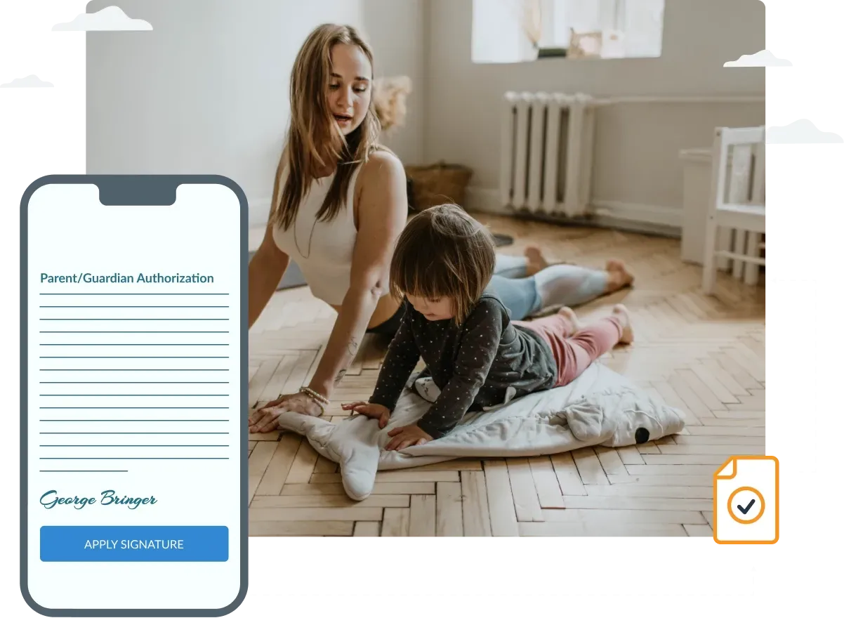 A woman and a child are laying on a yoga mat on the floor.