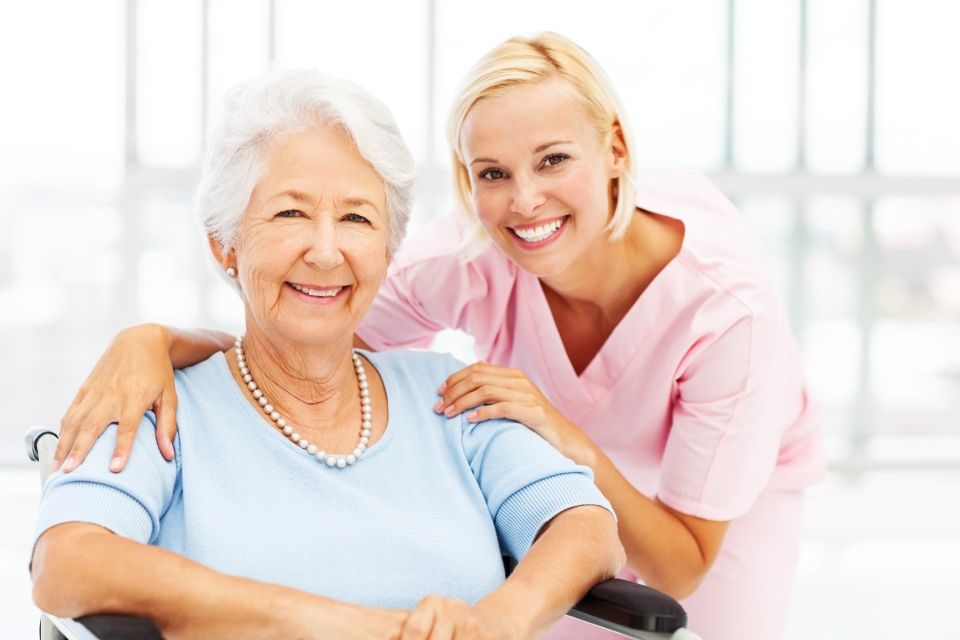Elderly woman with young woman
