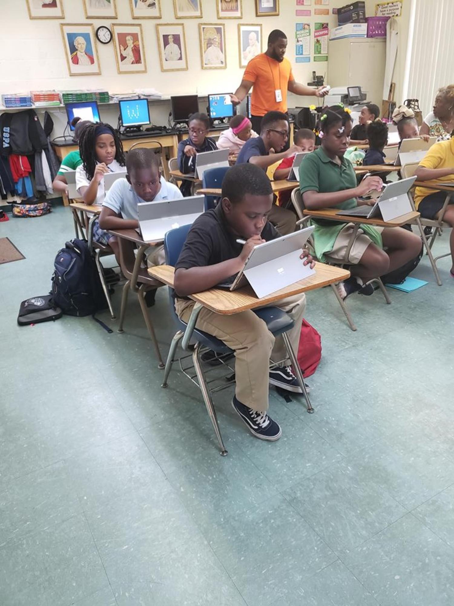 Students Using Tablet in Classroom — Miami, FL — Meagan’s Academic Tutorial Center