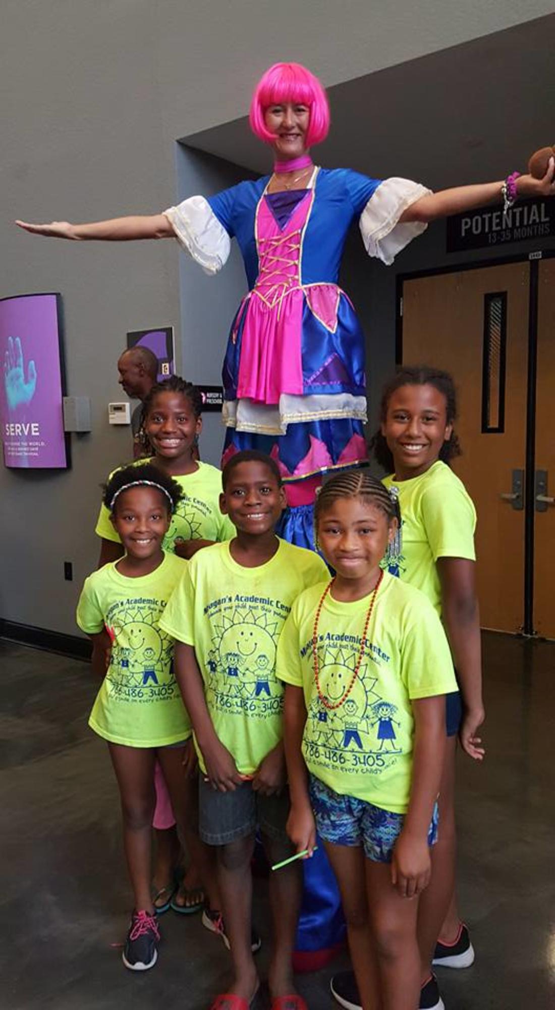 Students with Tall Girl — Miami, FL — Meagan’s Academic Tutorial Center