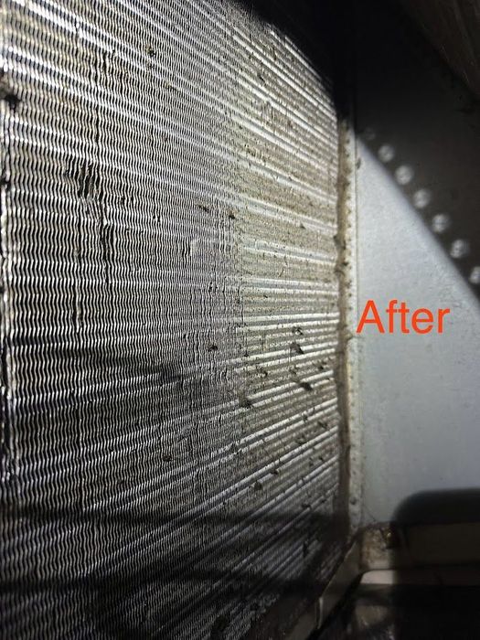 Furnace in a narrow utility closet with exposed pipes and ductwork, labeled “After” in red.