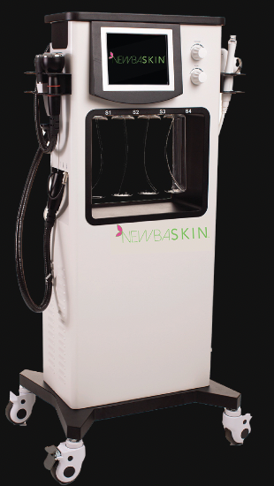 A white machine with a black background and the word skin on it