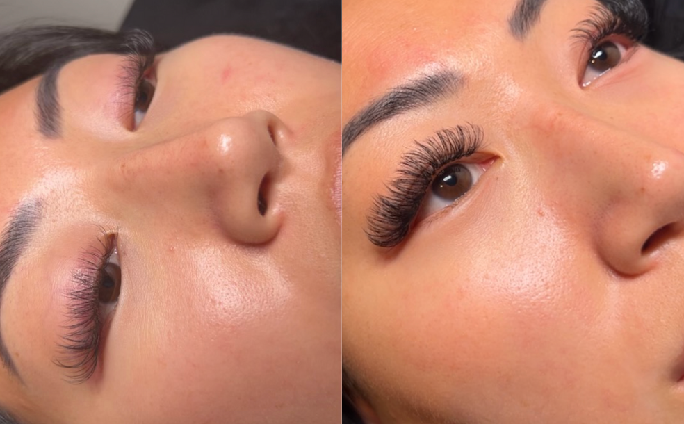 A close up of a woman 's face with a nose ring.