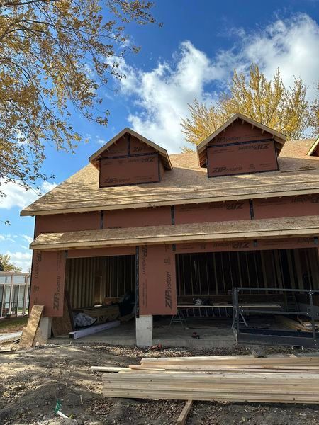 A House Is Being Built With A Roof And A Garage - Sandusky, OH - Petrick Roofing and Remodel LLC