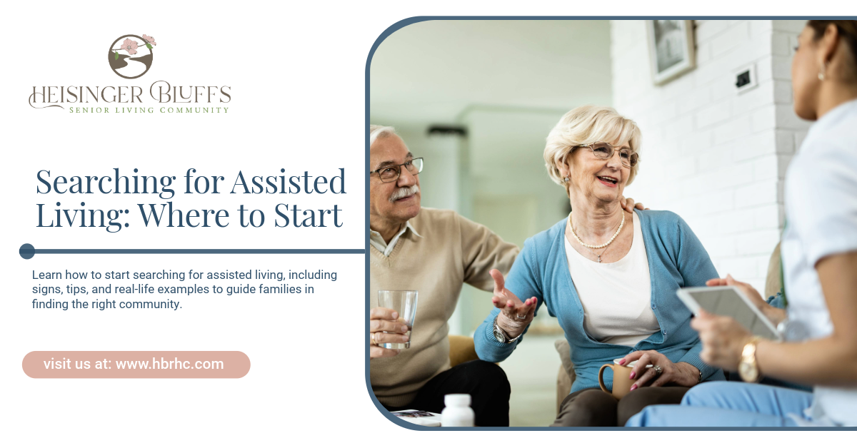 An elderly couple talking to an assisted living caregiver