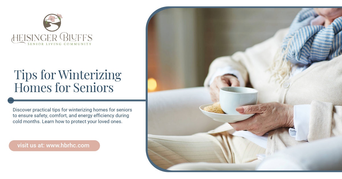 A senior during winter sitting on a couch holding a cup of tea