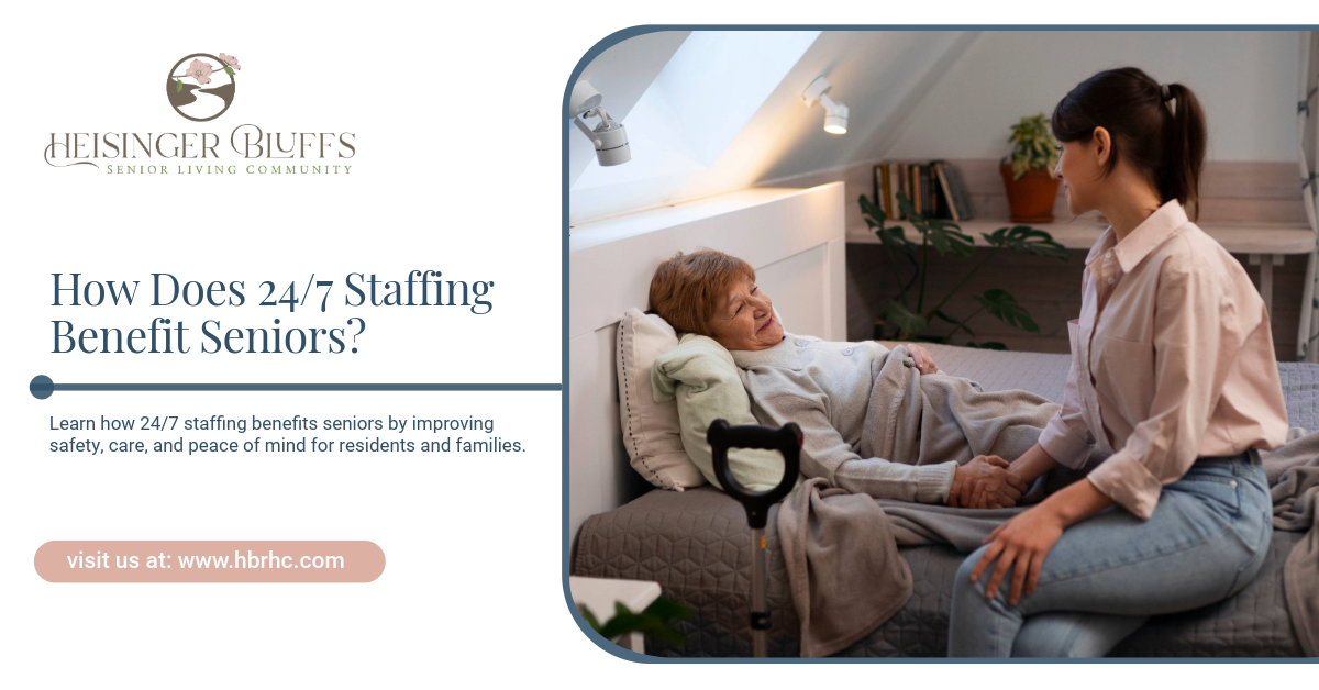 A senior woman lying in bed, being assisted by a 24/7 senior living caregiver