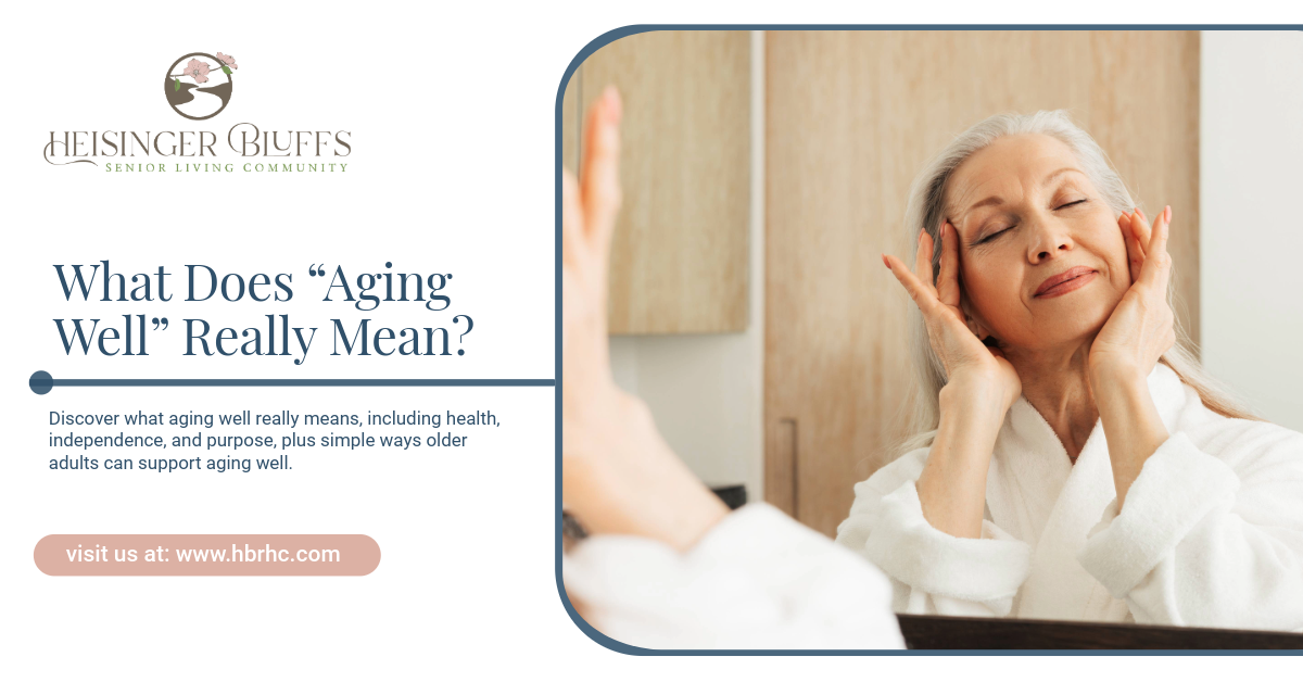 An elderly woman in a white robe is touching her face in front of a mirror,